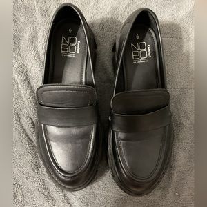 Cute platform slid in shoes .